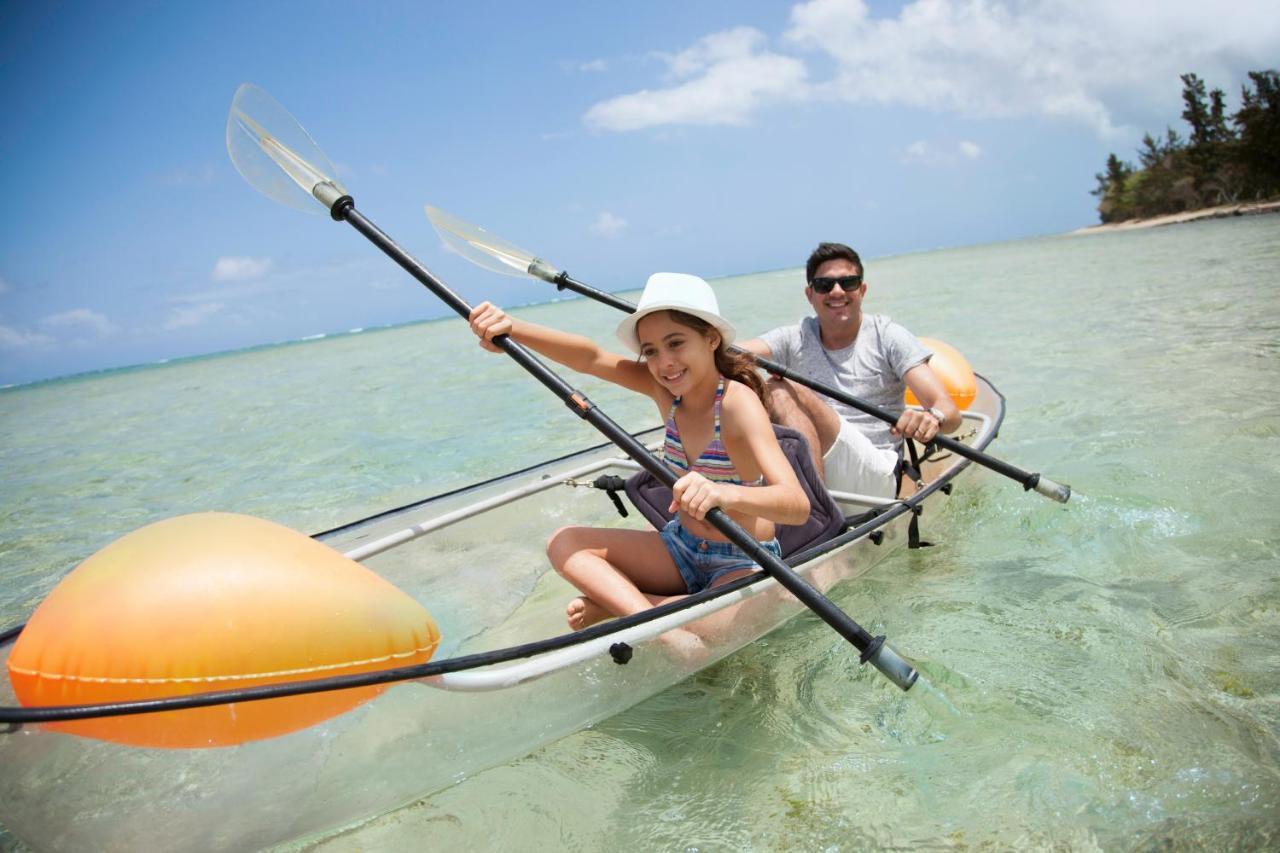 Heritage Le Telfair Golf & Wellness Resort Bel Ombre Bagian luar foto Kayaking at Sandals Emerald Reef Resort