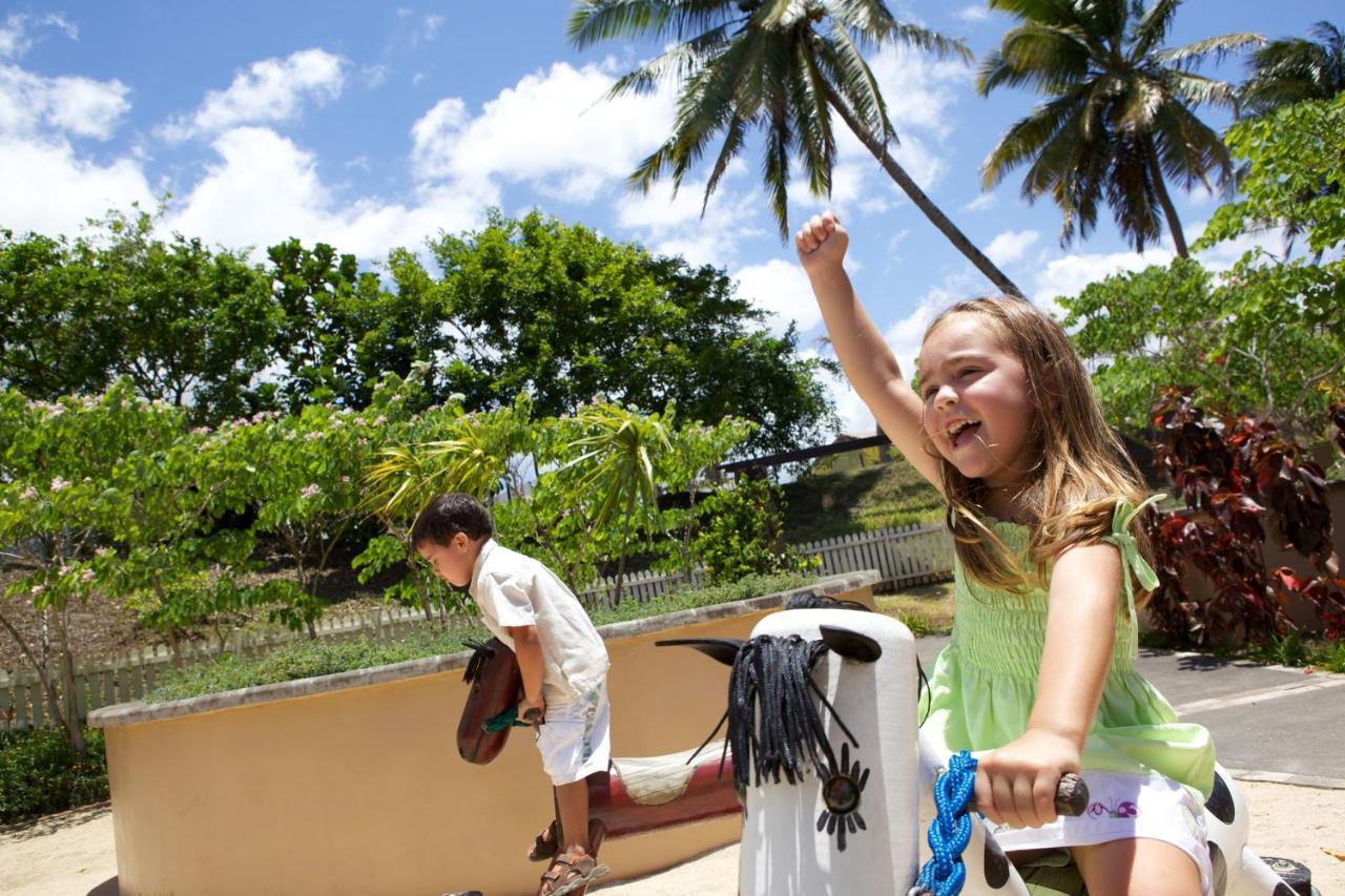 Heritage Le Telfair Golf & Wellness Resort Bel Ombre Bagian luar foto Children playing at the Children's Discovery Center