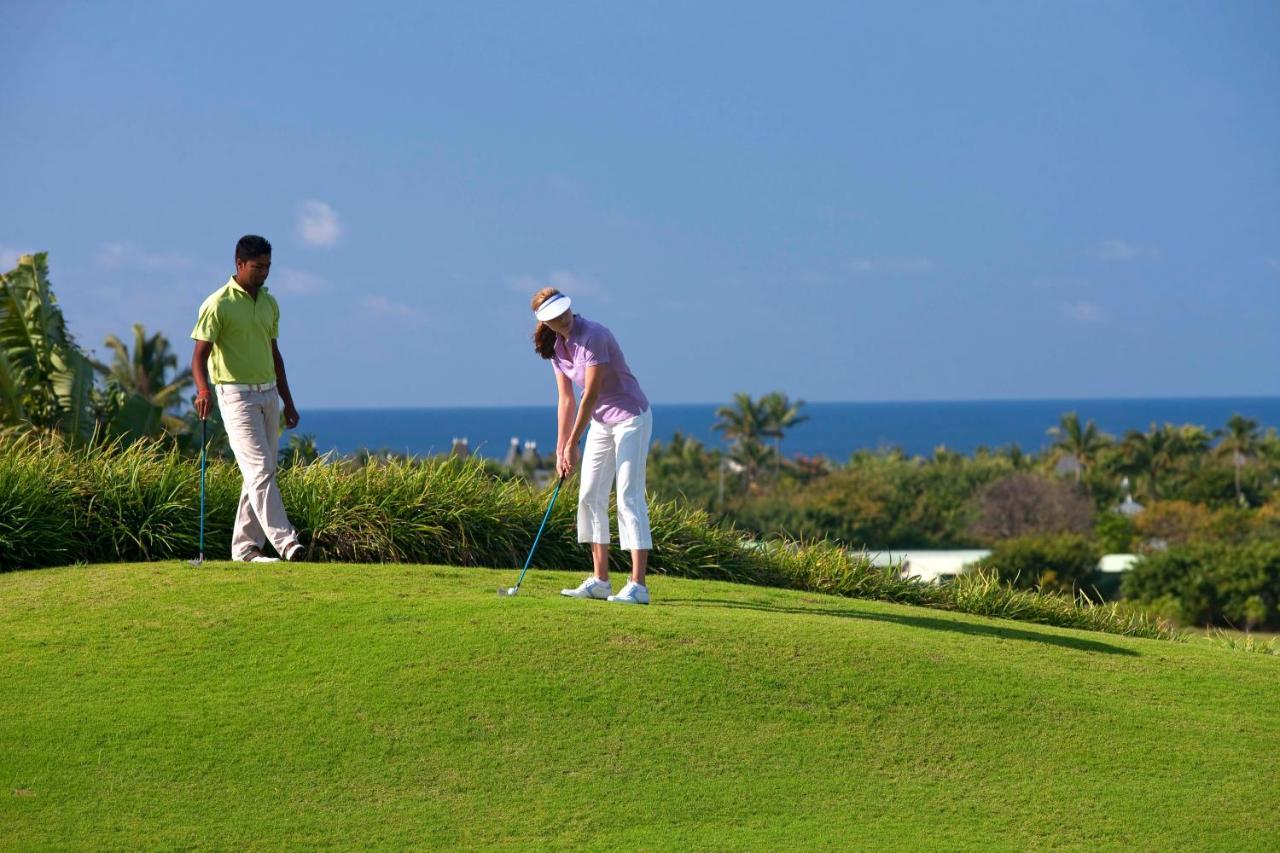 Heritage Le Telfair Golf & Wellness Resort Bel Ombre Bagian luar foto Golfers at the Four Seasons Resort