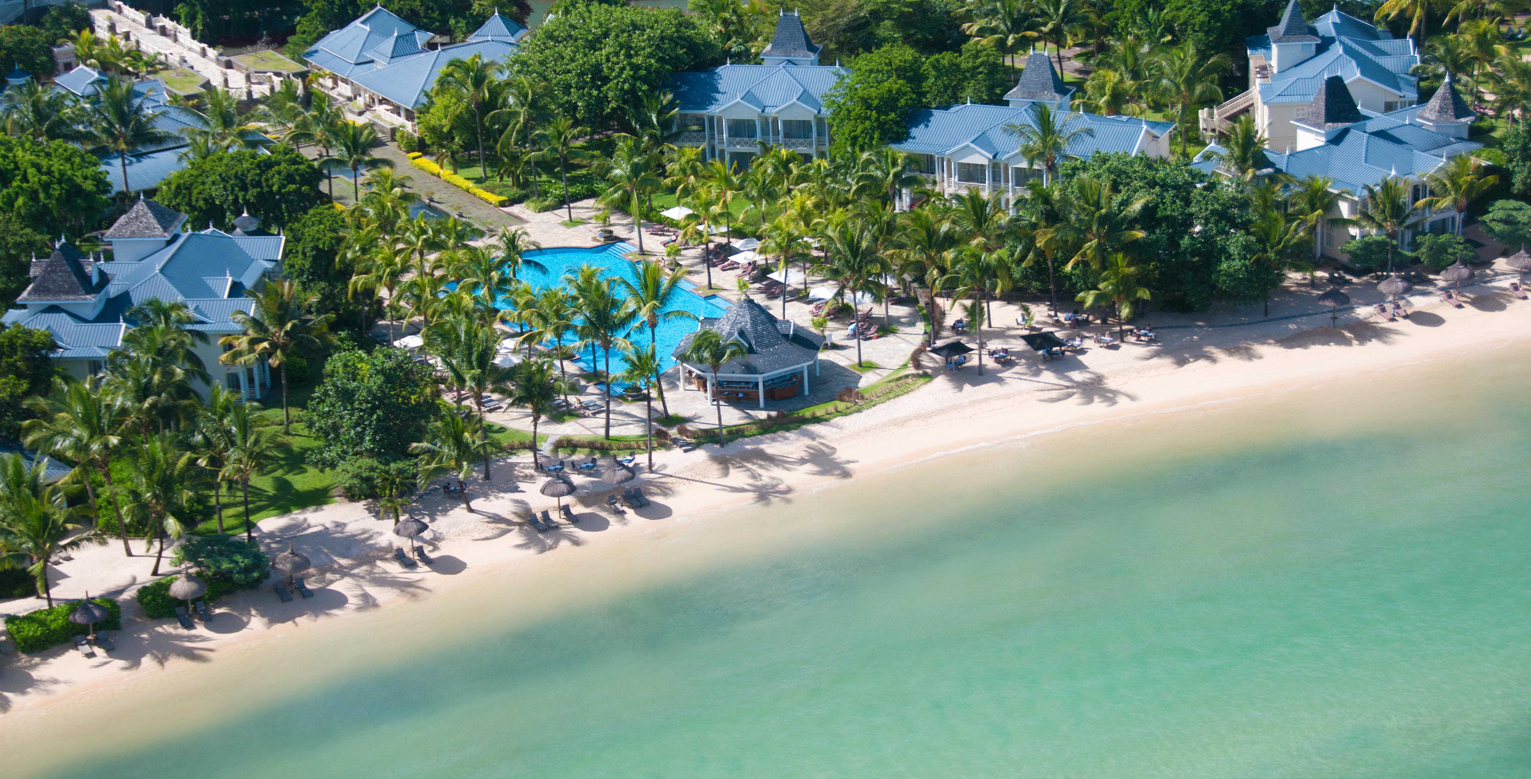 Heritage Le Telfair Golf & Wellness Resort Bel Ombre Bagian luar foto The beach at the resort