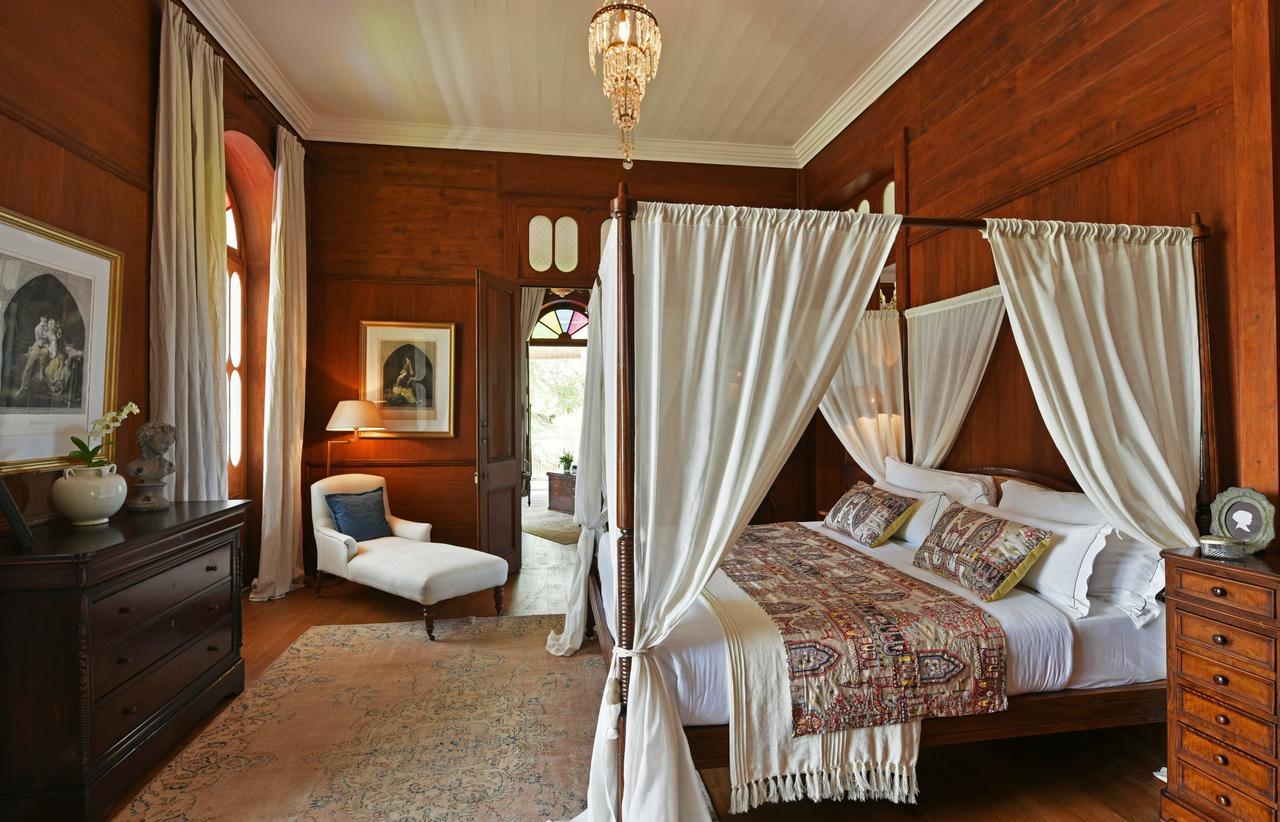 Heritage Le Telfair Golf & Wellness Resort Bel Ombre Bagian luar foto A bedroom at the hotel